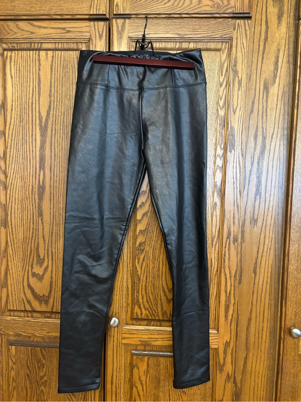 Like new women’s size medium Black Faux Leather Leggings